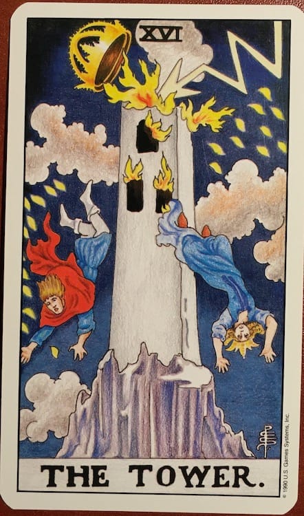 Photo of The Tower card from Tarot with lightning striking a tower and people falling out of the tower