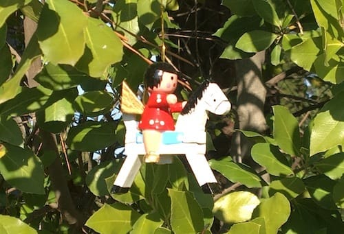 Holiday_tree_horse_2020 Close up shot of a Christmas ornament of an angel on a white horse